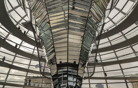 Berlin, Germany - Dec 20, 2023 - Architecture interior of the Cupola of the Reichstag dome is a glass dome constructed on top of the rebuilt Reichstag building. a major tourist attraction of the berlin city, Copy space, Selective focus.のeditorial素材