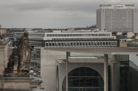 Berlin, Germany - Dec 20, 2023 - Berlin cityscape view from above of Reichstag building with Statue and Marie-Elisabeth-Lueders-Hau and buildings at the downtown Berlin. a major tourist attraction of the berlin city, Space for text, Selective focus.のeditorial素材