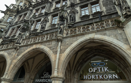 Munich, Germany - Dec 21, 2023 - Exterior architecture design details of famous New Town Hall (Neue Rathaus) on Marienplatz square in Munich. Gothic architectural style. Space for text, Selective focus.のeditorial素材