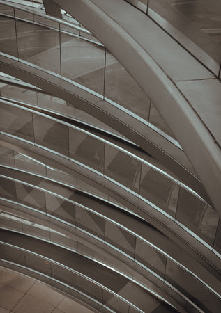 Berlin, Germany - Dec 20, 2023 - A curved walkway stretches in spirals upwards on top inside the glass dome constructed of the Reichstag building. Contemporary architecture of the Cupola of the Reichstag dome, a major tourist attraction of the berlin cityのeditorial素材