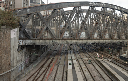 France, Paris - Jan 05, 2024 - Rue de l'Aqueduc Bridge (Viaduc de la rue de l'Aqueduc) built above the railways of gare de l'Est, Pont de Lafayette, Space for text, Selective focus.のeditorial素材