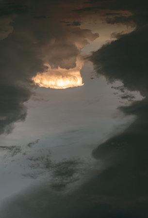 The sky is being covered with amazing clouds. Beautiful clouds like a heaven sky toward the light,...