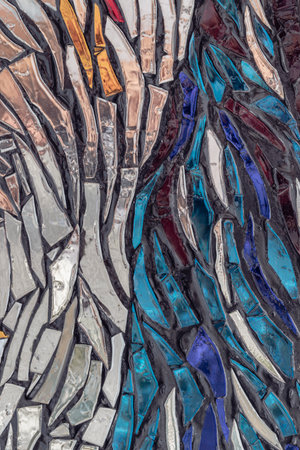 The walls are decorated with colorful Stained glass scraps mosaic. Scraps glass texture background, Creativity, art and design, Space for text, Selective focus.の写真素材
