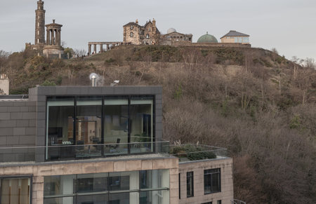 Edinburgh, Scotland - Jan 19, 2024 - View of Calton Hill with the skyline seen from the top of St James Quarter shopping centre in Edinburgh city. Destinations in Europe, Copy space, Selective focus.のeditorial素材