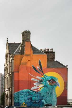 Liverpool, UK - Oct 07, 2023 - Colourful graffiti of a Liver bird (the symbol of my city Liverpool) has been painted on the side of The Wedding House on Great George place. built for The North and South Wales Bank, Impressive murals of a Secretary bird, Uのeditorial素材