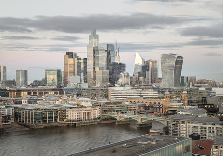 London, UK - Nov 07, 2023 - Evening time scene with bright glowing lights of various skyscrapers at London city. View of Architectural modern high-rise buildings, Nice city view, Space for text, Selective Focus.のeditorial素材