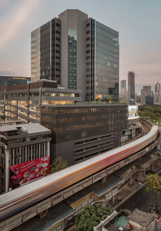 Bangkok, Thailand - 31 Dec, 2022 - BTS Sky railway tracks and Intersection bridge pass through in...