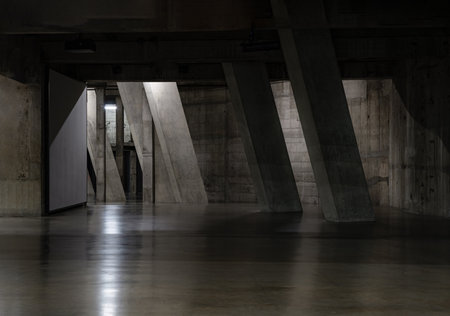London, UK - Nov 07, 2023 - View of Concrete pillars inside Blavatnik Building of Tate Modern Switch House extension. Interior at Tate modern its distinctive and lattice brickwork. Angular structure, Copy space, Selective Focus.のeditorial素材