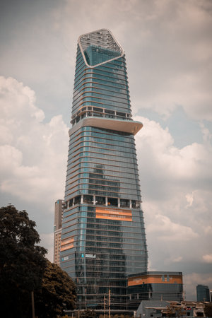 Bangkok, Thailand - 17 Oct, 2024 - Architecture exterior of KingBridge tower with sky background in the city of Bangkok at afternoon. Space for text, Selective focus.のeditorial素材