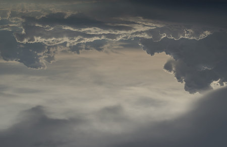 The sky is being covered with amazing clouds. Beautiful clouds like a heaven sky toward the light,...