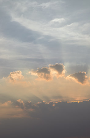 Colorful dramatic sky with cloud before sunset. Amazing clouds like a heaven for background  and texture, Concept idea of ââImaginative clouds nature, use it as your Wallpaper, Poster and Copy space, Selective focus.の写真素材