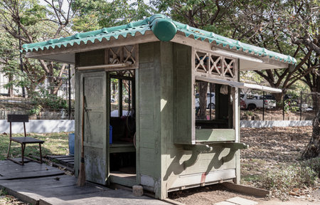 Security guard olive green booth (Guardhouse) in public park. Security guard cabin, Security Booth, use it as your Wallpaper, Poster and Space for text, Selective focus.の写真素材
