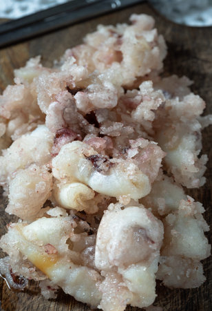 Homemade Crispy And Crunchy Deep-Fried Squid or Deep-Fried Calamari served on Wooden background, use it as your Wallpaper, Poster and Copy space, Selective focus.の写真素材