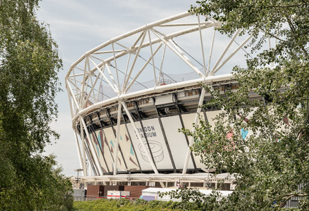 London, UK - Jun 21, 2025 - Exterior view of London Stadium is the home ground of West ham united Fooball Club, located winhin the Queen Elizabeth Olympic Park in the Stratford district of London. use it as your Wallpaper, Poster and Space for text, Selective focus.の写真素材
