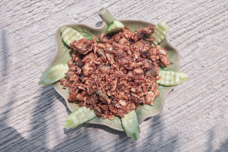 Top view of Deep fried with Garlic on Ceramic plate. use it as your wallpaper, poster and space for text, Selective focus.の写真素材