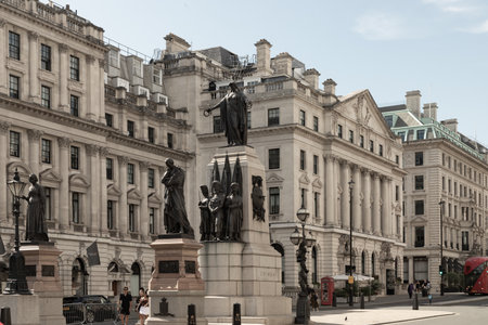 London, UK - Jul 12, 2025 - the Guards Crimean War Memorial, It commemorates the Allied victory in the Crimean War (1853â56) and specifically honors the 2,162 soldiers of the Brigade of Guards who lost their lives during the conflict, The memorial stands on Waterloo Place, at the junction of Regent Street and Pall Mall. use it as your Wallpaper, Poster and Space for text, Selective focus.の写真素材