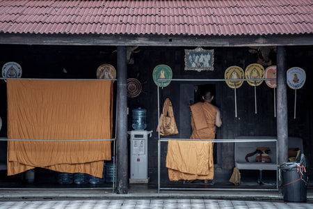 Ratchaburi, Thailand - Sep 22,2019 : Monks have just finished from the monk praying activity and returning monk's dwelling.のeditorial素材