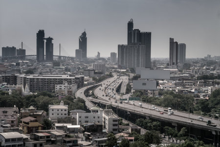 Bangkok, thailand -19 Nov, 2019 : Aerial view of cars driving on highway junctions. Bridge roads with green garden and trees in connection of architecture concept. Top view. Urban city.のeditorial素材