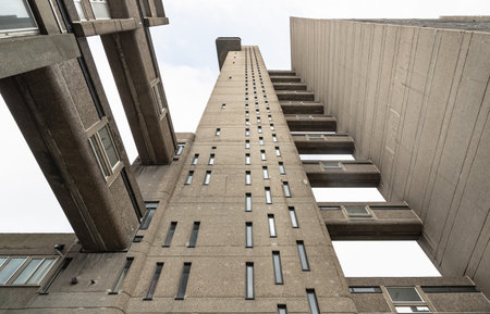 London, UK - Aug 23, 2025 - Trellick Tower is indeed recognized for its unique aesthetic and status as a significant example of Brutalist architecture, characterized by its use of raw concrete surfaces (bÃ©ton brut) often left exposed both internally and externally with distinctive, functional design. use it as your Wallpaper, Poster and Copy space, Select Focus.の写真素材