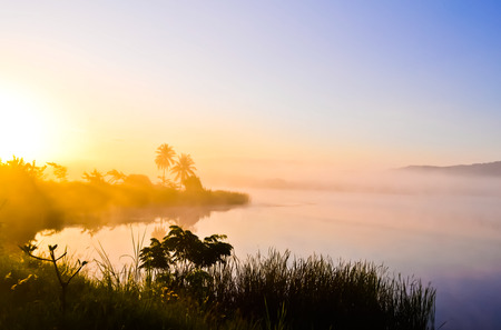 Sunrise on the lake at wangnahmyenの写真素材