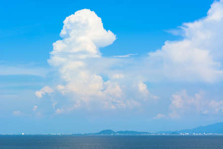 Blue sky with white cloudsの写真素材