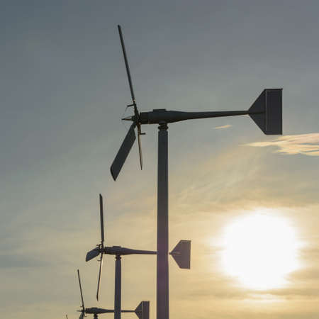 Wind turbines at sunsetの写真素材