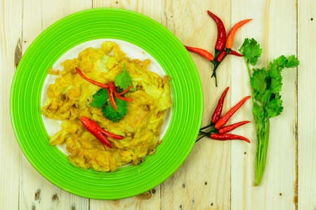 Ingredients for making omelets on wooden backgroundの写真素材