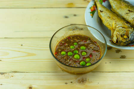 Shrimp paste and curry with fried mackerel and vegetableの写真素材