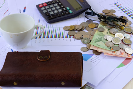 Work desk with documents and money Project About Business Growthの写真素材