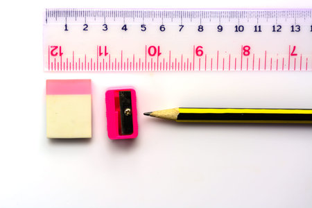 Pencil, eraser, sharpener, ruler