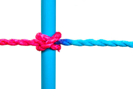 Connected group concept as many different ropes tied and linked together as an unbreakable chain as a community trust and faith metaphor and learningの写真素材