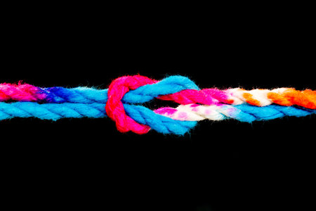 Connected group concept as many different ropes tied and linked together as an unbreakable chain as...