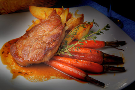 pork steak with carrot and potatoes