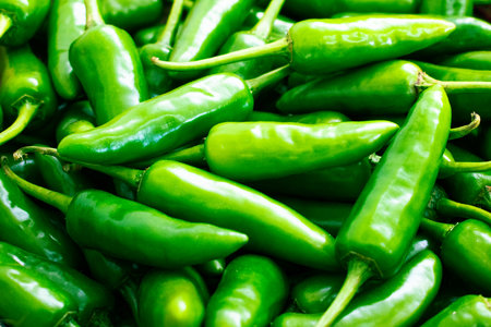 Fresh green Anaheim chile pepper background.の写真素材