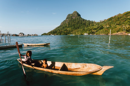Semporna, Sabah, Malaysia - 26 April 2020 - Sea gypsies on a boat