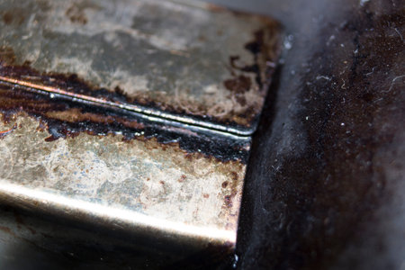 oily rusty dirty metal macro detail photoの写真素材