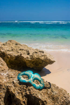 masquerade party mask on beach view photoの写真素材