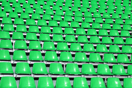 Green seats in a Sports Venue without peopleの写真素材