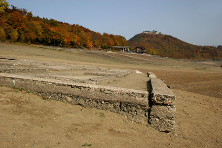 Reservoir lake Edersee in Germany. The old cementary of the village Berich that had been 1914 flooded. 134 people had to leave their homes. The photos was taken 2008 (Oct./13) while low water, 23 meters under top water level.の写真素材