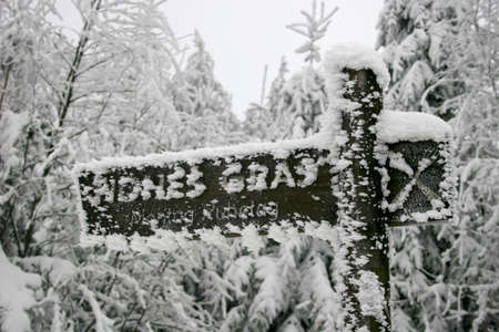 Icy sign in the Habichtswald mountains near Kassel, Germanyの写真素材