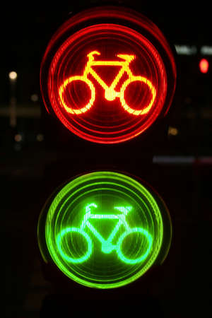 Green and red traffic light for bicyclistsの写真素材