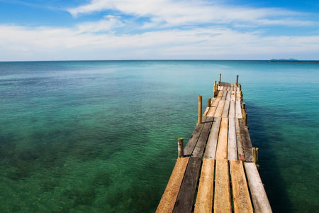 wooden pier and turquoise waterの写真素材