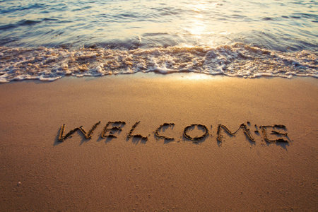 welcome sign concept on the beachの写真素材
