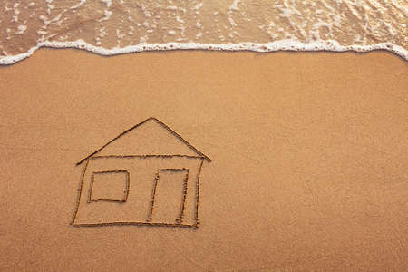 house painted on the beachの写真素材