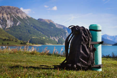 backpack on the mountain backgroundの写真素材