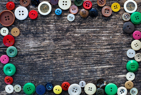 sewing background with frame from buttonsの写真素材