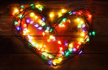 christmas lights, new year garland in heart shapeの写真素材