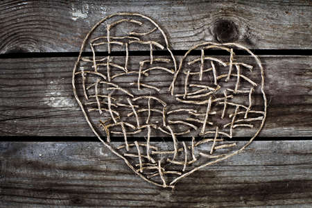 heart on wooden backgroundの写真素材