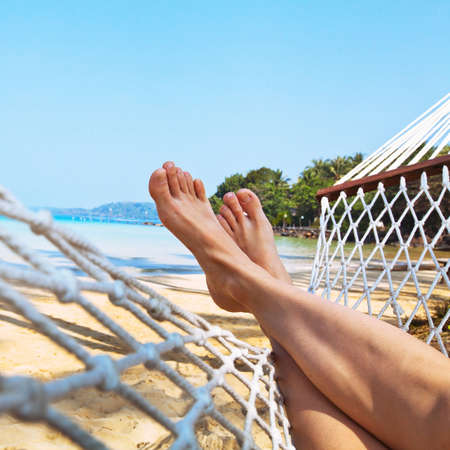 relax on the beach in hammockの写真素材