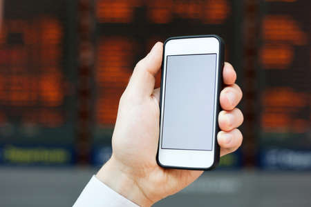 smartphone in the airportの写真素材